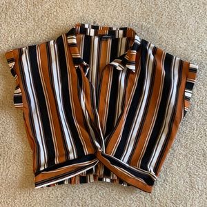 Vertical stripe front twist blouse